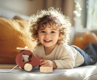 Speedy Monkey wooden toys collection – pull-alongs, xylophones, puzzles, fishing games, and stackers for toddlers, available at Pink Poppies
