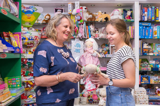 Kids gifts at Pink Poppies — toys, puzzles, and baby shower presents for little ones.